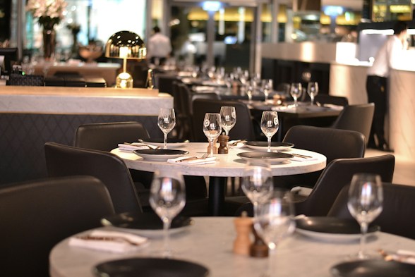 Tables are set and ready for dinner.