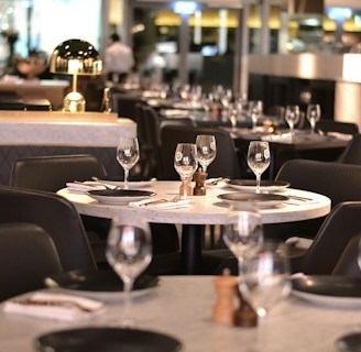 Tables are set and ready for dinner.